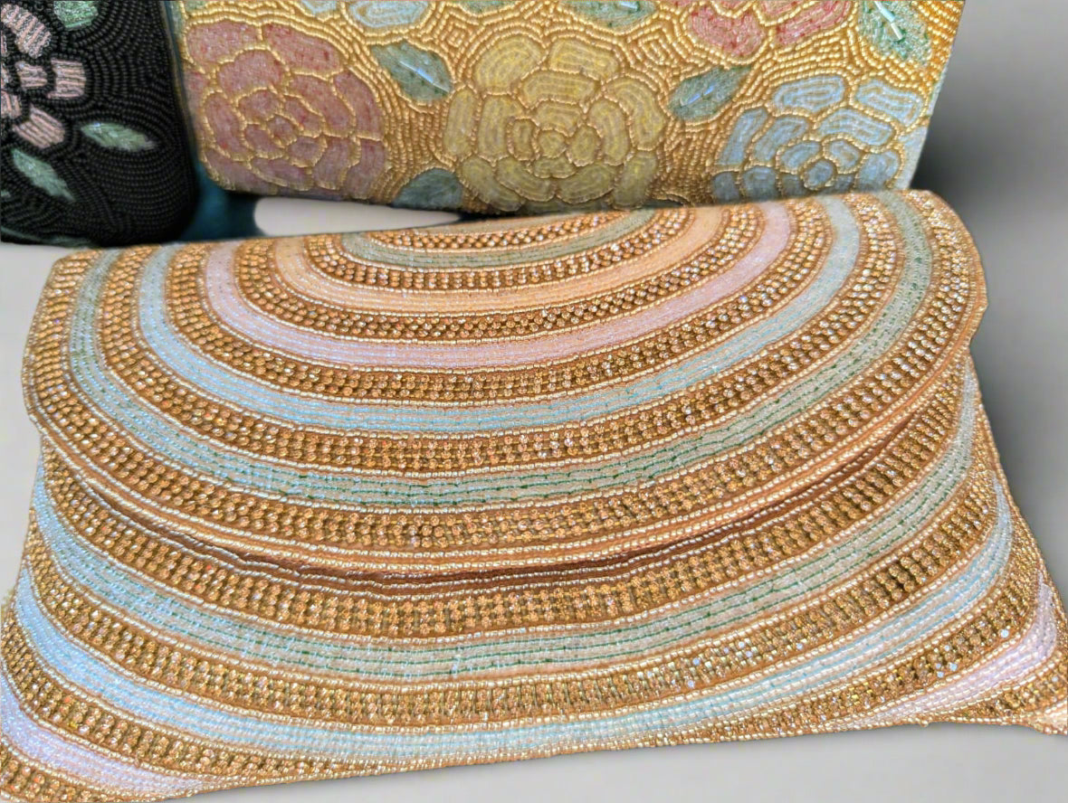 Exquisite golden handcrafted beaded purse with hues of Pink and Blue