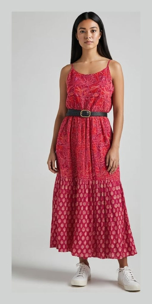 A striking red and pink floral print strap dress