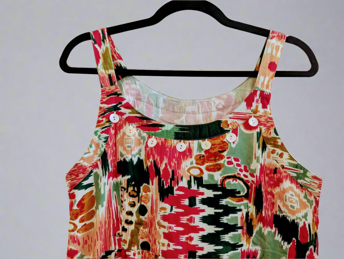 Stylish multi-colored abstract print tiered dress with a relaxed fit.